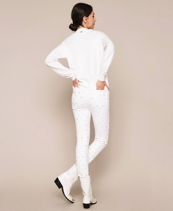 Пуловер с бахромой из стразов