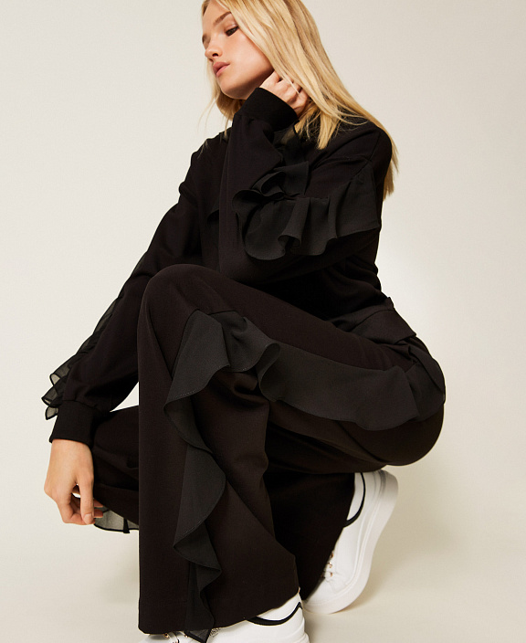 Брюки с оборками из жоржета