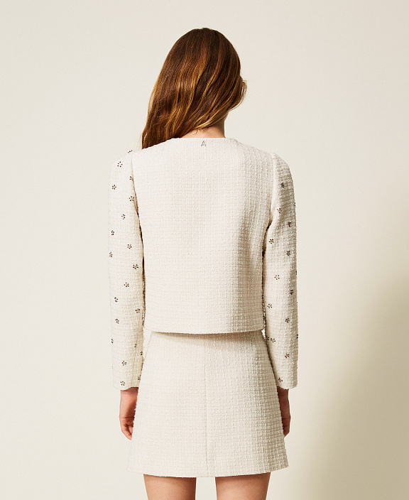 Мини-юбка из букле с вышивкой