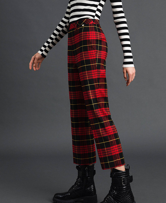 Расклешенные шерстяные брюки в клетку
